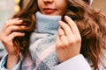 Young beautiful smiling woman in scarf and hat in autumn or winter Royalty Free Stock Photo