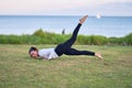 Young beautiful sportwoman with smiling happy practicing yoga Royalty Free Stock Photo