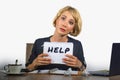 Young beautiful and stressed business woman working overwhelmed and depressed at office laptop computer desk asking for help feeli Royalty Free Stock Photo