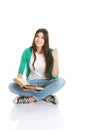 Young beautiful student sitting with book, reading, learning. Royalty Free Stock Photo