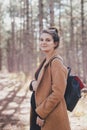 Young regnant woman posing in autumn park Royalty Free Stock Photo