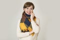 Young beautiful and stylish 30s red hair woman sweater and Autumn colorful scarf smiling happy