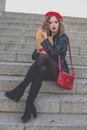 Young beautiful stylish woman portrait. Female with long curly hair Royalty Free Stock Photo