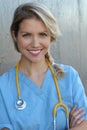 Young beautiful successful female doctor with stethoscope - portrait Royalty Free Stock Photo