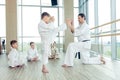 young, beautiful, successful multi ethical kids in karate positi Royalty Free Stock Photo