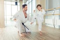 young, beautiful, successful multi ethical kids in karate positi Royalty Free Stock Photo