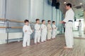 young, beautiful, successful multi ethical kids in karate positi Royalty Free Stock Photo