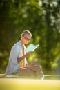 Young Beautiful Suntanned Woman  relaxing next to a Swimming Pool Royalty Free Stock Photo