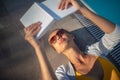 Young Beautiful Suntanned Woman wearing sunglasses Royalty Free Stock Photo