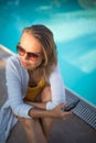 Young Beautiful Suntanned Woman wearing sunglasses Royalty Free Stock Photo