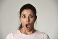 Young beautiful surprised woman amazed in shock and surprise with mouth big opened Royalty Free Stock Photo