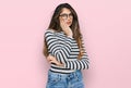 Young beautiful teen girl wearing casual clothes and glasses thinking looking tired and bored with depression problems with Royalty Free Stock Photo