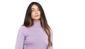 Young beautiful teen girl wearing turtleneck sweater relaxed with serious expression on face Royalty Free Stock Photo