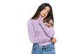 Young beautiful teen girl wearing turtleneck sweater thinking looking tired and bored with depression problems with crossed arms Royalty Free Stock Photo