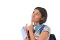 Young beautiful and trendy latin student girl holding notepad folder and book carrying backpack thinking happy Royalty Free Stock Photo