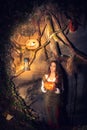 Young beautiful witch in her cave. Royalty Free Stock Photo