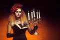 Young and beautiful witch making witchcraft Royalty Free Stock Photo