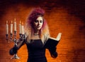 Young and beautiful witch making witchcraft Royalty Free Stock Photo