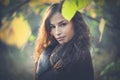 Young beautiful woman autumn portrait in forest Royalty Free Stock Photo