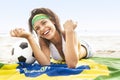 Young beautiful woman in bikini on beach with Brazil flag Royalty Free Stock Photo