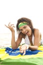 Young beautiful woman in bikini on beach with Brazil flag Royalty Free Stock Photo