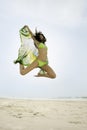 Young beautiful woman in bikini on beach with Brazil flag Royalty Free Stock Photo