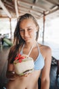 Young beautiful woman drinking coconut water in thai cafe Royalty Free Stock Photo