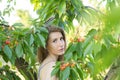 Young woman posing in spring garden Royalty Free Stock Photo