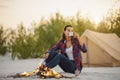 Woman Camping Near Campfire Royalty Free Stock Photo