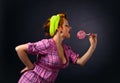 Young beautiful woman with candy Royalty Free Stock Photo