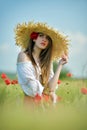 Young beautiful woman on cereal field in summer Royalty Free Stock Photo