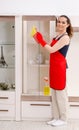 Young beautiful woman cleaning apartment Royalty Free Stock Photo