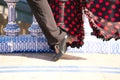 Young and beautiful woman dancing flamenco and Spanish posing in urban clothes, wearing her hair loose and long and standing on