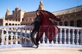 Young and beautiful woman dancing flamenco and Spanish posing in urban clothes, wearing her hair loose and long and standing on Royalty Free Stock Photo