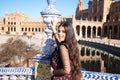 Young and beautiful woman dancing flamenco and typical Spanish woman posing with urban and modern clothes, wearing her hair loose Royalty Free Stock Photo