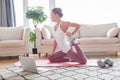 Young beautiful woman doing fitness exercises at home. Sport, recreation and healthy lifestyle concept Royalty Free Stock Photo