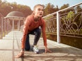 Young beautiful woman doing fitness in a park. Royalty Free Stock Photo