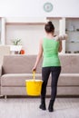 The young beautiful woman doing renovation at home Royalty Free Stock Photo