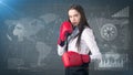 Young beautiful woman dress in white shirt standing in combat pose with red boxing gloves. Business concept. Royalty Free Stock Photo