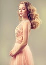 Young beautiful woman, dressed in evening gown. Royalty Free Stock Photo