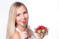 Young beautiful woman eats vegetable salad. Healthy eating. To be in shape. Royalty Free Stock Photo