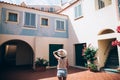 Young beautiful woman enjoy cozy Italy courtyard in Sardinia isl Royalty Free Stock Photo