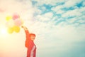 Young beautiful woman enjoying Multicolored balloons in the brig Royalty Free Stock Photo