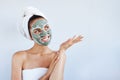 Young beautiful woman in face mask of therapeutic blue mud. Spa Royalty Free Stock Photo