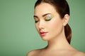 Young beautiful woman with flower makeup eyes Royalty Free Stock Photo