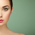 Young beautiful woman with flower makeup eyes Royalty Free Stock Photo