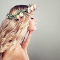 Young Beautiful Woman with Flowers in her Hair Royalty Free Stock Photo