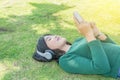 Young beautiful woman girl listening music headphones outdoor Royalty Free Stock Photo