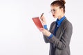 Young beautiful woman in glasses checks homework, emotions, teacher, white isolated background