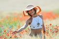 Young beautiful woman on golden wheat field in summer Royalty Free Stock Photo